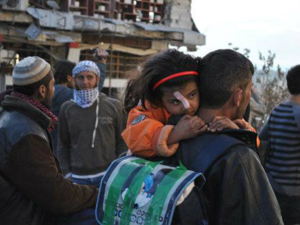 Retirada de civis de Homs é suspensa em meio a negociações