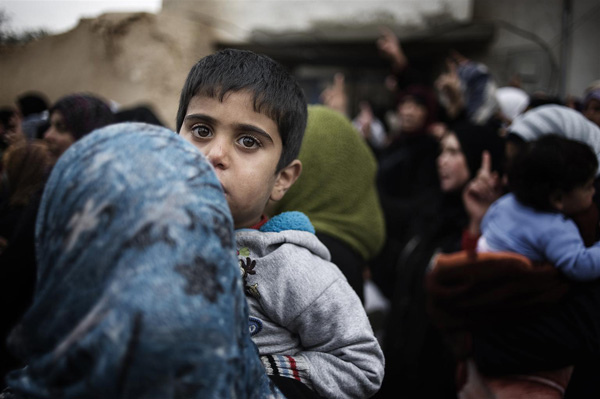 UNICEF apoia cerca de 500 crianças e mulheres retiradas da área sitiada em Homs, na Síria